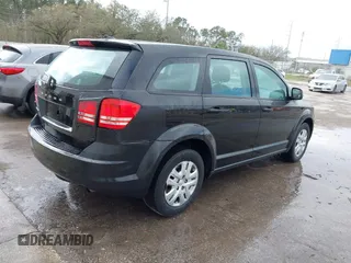 2015 Dodge Journey American Value Pkg with VIN 3C4PDCABXFT637428, listed as a IAAI auction lot 41507850 with 209,050 mi miles. Bid and sale history available at carsss.com. Image 4.