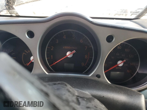 2007 Nissan 350Z Touring z VIN JN1BZ36A27M654150, wystawiony jako Copart lot #52939845 z przebiegiem Nie podano mil oraz Szkoda całkowita • Salvage title. Historia ofert i sprzedaży dostępna na DreamBid. Obrazek 9.
