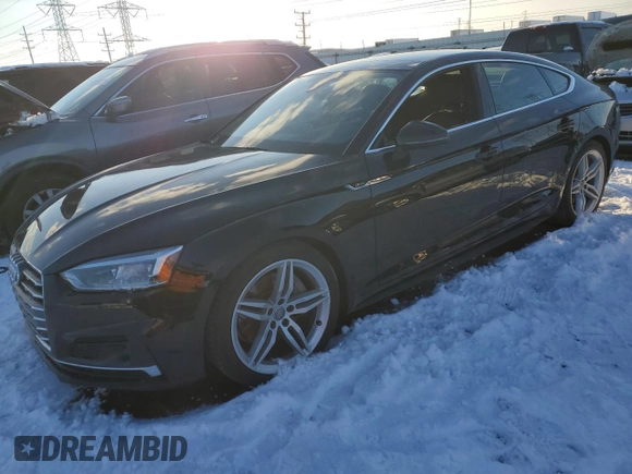2018 Audi A5 Sportback Prestige z VIN WAUFNCF55JA047761, wystawiony jako Copart lot #85210464 z przebiegiem Nie podano mil oraz Szkoda całkowita • Salvage title. Historia ofert i sprzedaży dostępna na DreamBid. Obrazek 1.