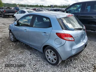 2013 Mazda 2 Sport with VIN JM1DE1KY5D0162904, listed as a Copart auction lot 57712794 with 138,718 mi miles and Salvage Title. Bid and sale history available at carsss.com. Image 2.