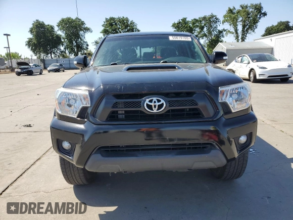 2014 Toyota Tacoma PreRunner with VIN 3TMJU4GN8EM160990, listed as a Copart auction lot 55619165 with 96,327 mi miles and Salvage Title. Bid and sale history available at DreamBid. Image 5.
