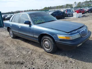 1996 Mercury Grand Marquis GS with VIN 2MELM74W8TX697141, listed as a IAAI auction lot 42082750 with 138,963 mi miles and . Bid and sale history available at DreamBid. Image 1.
