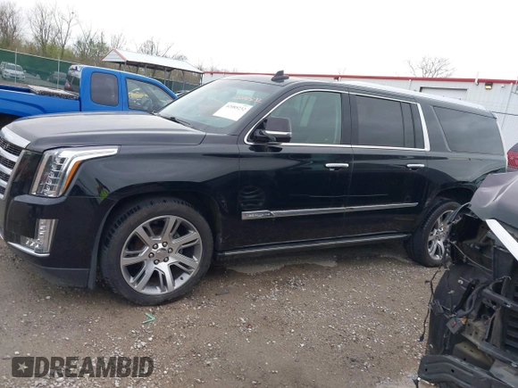 2015 Cadillac Escalade ESV Premium z VIN 1GYS4TKJ3FR726972, wystawiony jako IAAI lot #42085232 z przebiegiem 234 115 mil mil oraz . Historia ofert i sprzedaży dostępna na DreamBid. Obrazek 14.