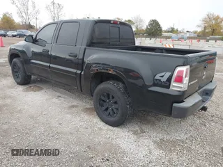 2008 Mitsubishi Raider LS with VIN 1Z7HT28K38S588511, listed as a IAAI auction lot 40750993 with 196,501 mi miles. Bid and sale history available at carsss.com. Image 3.