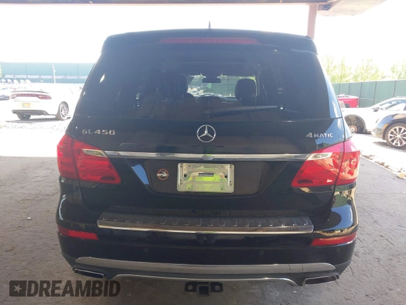 2014 Mercedes-Benz GL 450 z VIN 4JGDF7CE7EA395551, wystawiony jako IAAI lot #42247332 z przebiegiem 105 636 mil mil oraz . Historia ofert i sprzedaży dostępna na DreamBid. Obrazek 17.