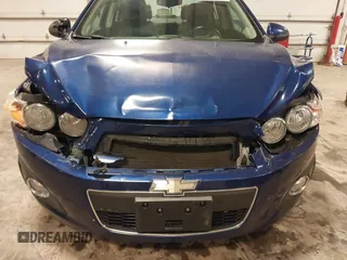 2012 Chevrolet Sonic LTZ z VIN 1G1JE5SB4C4214450, wystawiony jako IAAI lot #42207345 z przebiegiem 120 152 mil mil oraz . Historia ofert i sprzedaży dostępna na DreamBid. Obrazek 6.