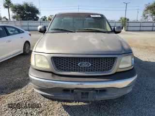 2002 Ford F-150 XL z VIN 1FTRX17232KC51909, wystawiony jako Copart lot #62081725 z przebiegiem Nie podano mil oraz Czysty tytuł • Clean title. Historia ofert i sprzedaży dostępna na DreamBid. Obrazek 5.