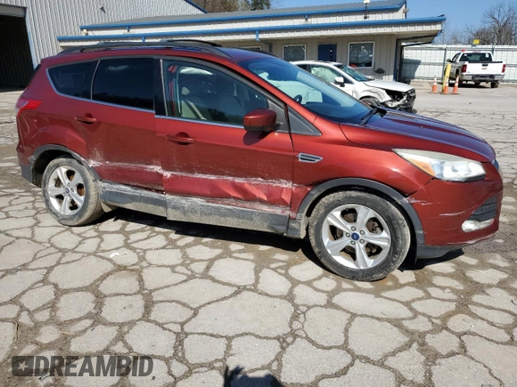 2014 Ford Escape SE with VIN 1FMCU0GX4EUC28518, listed as a Copart auction lot 50629705 with 122,624 mi miles and Salvage Title. Bid and sale history available at carsss.com. Image 4.