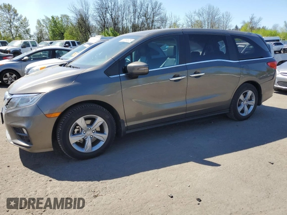 2018 Honda Odyssey EX-L z VIN 5FNRL6H71JB016424, wystawiony jako Copart lot #53859505 z przebiegiem 91 669 mil mil oraz Szkoda całkowita • Salvage title. Historia ofert i sprzedaży dostępna na DreamBid. Obrazek 1.