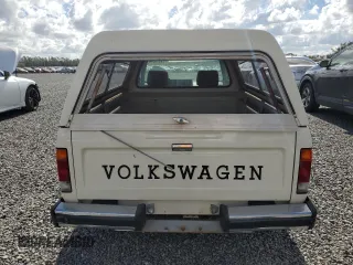1983 Volkswagen Rabbit z VIN 1V1KG0170DV038002, wystawiony jako Copart lot #79815264 z przebiegiem 147 480 mil mil oraz Szkody całkowita. Historia ofert i sprzedaży dostępna na DreamBid. Obrazek 6.