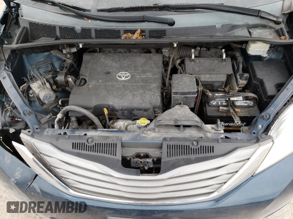2012 Toyota Sienna XLE AAS with VIN 5TDYK3DC7CS216061, listed as a Copart auction lot 60596715 with 112,713 mi miles and Salvage title. Bid and sale history available at DreamBid. Image 12.