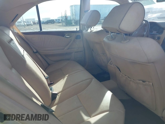 2002 Mercedes-Benz E-Class with VIN WDBJF65J92B479841, listed as a IAAI auction lot 41471955 with 203,527 mi miles. Bid and sale history available at carsss.com. Image 8.