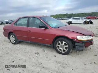 2000 Honda Accord SE with VIN JHMCG5674YC006242, listed as a Copart auction lot 51856525 with 287,160 mi miles and Salvage title. Bid and sale history available at DreamBid. Image 4.