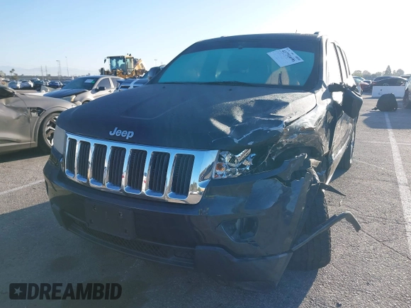 2013 Jeep Grand Cherokee Laredo with VIN 1C4RJEAG2DC643290, listed as a IAAI auction lot 41751696 with 125,258 mi miles. Bid and sale history available at carsss.com. Image 17.