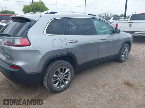 2021 Jeep Cherokee Altitude with VIN 1C4PJLLB2MD164004, listed as a IAAI auction lot 42083946 with 99,136 mi miles and . Bid and sale history available at DreamBid. Image 4.