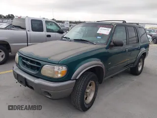 2000 Ford Explorer XLT z VIN 1FMZU63EXYZA22693, wystawiony jako IAAI lot #41350520 z przebiegiem 244 843 mil mil oraz . Historia ofert i sprzedaży dostępna na DreamBid. Obrazek 2.