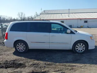 2013 Chrysler Town & Country Touring with VIN 2C4RC1BG8DR573559, listed as a IAAI auction lot 41793874 with 205,005 mi miles. Bid and sale history available at carsss.com. Image 14.