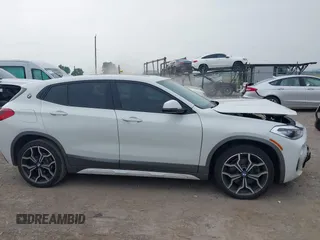 2018 BMW X2 xDrive28i z VIN WBXYJ5C3XJEF76384, wystawiony jako IAAI lot #42439783 z przebiegiem 85 742 mil mil oraz . Historia ofert i sprzedaży dostępna na DreamBid. Obrazek 13.