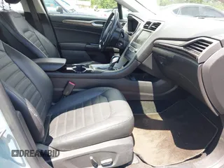 2014 Ford Fusion SE Hybrid with VIN 3FA6P0LU7ER154559, listed as a IAAI auction lot 42198548 with 244,630 mi miles. Bid and sale history available at carsss.com. Image 5.