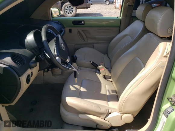 2004 Volkswagen New Beetle Coupe GL with VIN 3VWBK31C74M412879, listed as a Copart auction lot 50596255 with 192,058 mi miles and Salvage Title. Bid and sale history available at carsss.com. Image 7.