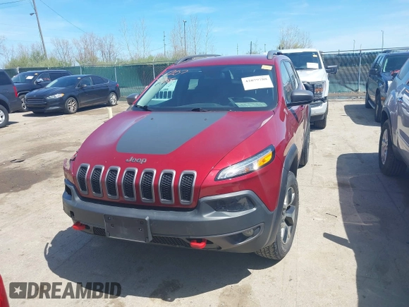 2016 Jeep Cherokee Trailhawk with VIN 1C4PJMBS9GW237059, listed as a IAAI auction lot 42079788 with 114,513 mi miles. Bid and sale history available at carsss.com. Image 13.