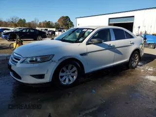 2011 Ford Taurus SE with VIN 1FAHP2DW7BG132939, listed as a Copart auction lot 84284134 with 185,117 mi miles and Salvage Title. Bid and sale history available at carsss.com. Image 1.
