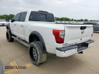 2016 Nissan Titan Platinum Reserve с VIN 1N6BA1F21GN513109, выставлен на аукционе Copart как лот 56116825 с пробегом 94 263 миль миль и Чистый • Clean title. История ставок и продаж доступна на DreamBid. Изображение 2.