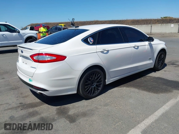 2016 Ford Fusion Titanium z VIN 3FA6P0SU2GR357508, wystawiony jako IAAI lot #42551834 z przebiegiem 177 425 mil mil oraz . Historia ofert i sprzedaży dostępna na DreamBid. Obrazek 4.