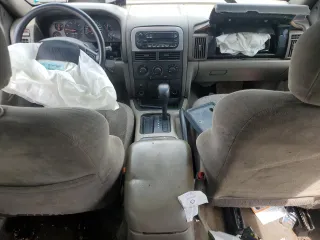 2000 Jeep Grand Cherokee Laredo с VIN 1J4G248S4YC299003, выставлен на аукционе Copart как лот 55937685 с пробегом Не указан миль и Списание • Salvage title. История ставок и продаж доступна на DreamBid. Изображение 8.