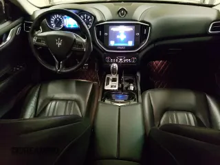 2016 Maserati Ghibli S Q4 with VIN ZAM57RTA3G1171304, listed as a Copart auction lot 69976983 with 97,099 mi miles. Bid and sale history available at carsss.com. Image 8.