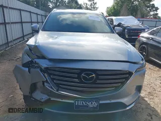 2020 Mazda CX-9 Grand Touring with VIN JM3TCADY2L0406173, listed as a IAAI auction lot 42217230 with 110,465 mi miles and . Bid and sale history available at DreamBid. Image 12.