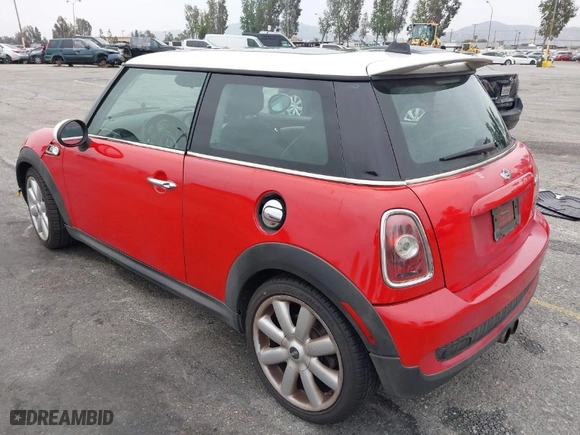 2009 MINI Cooper Hardtop S with VIN WMWMF73549TW87458, listed as a IAAI auction lot 42051759 with 135,309 mi miles. Bid and sale history available at carsss.com. Image 3.