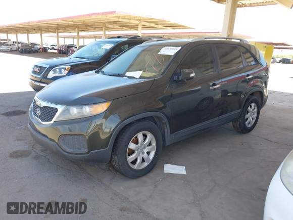 2012 Kia Sorento LX with VIN 5XYKT4A21CG242866, listed as a IAAI auction lot 42172159 with 217,651 mi miles. Bid and sale history available at carsss.com. Image 2.