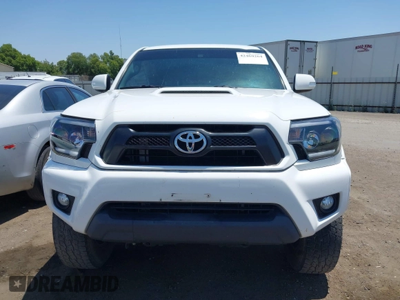 2014 Toyota Tacoma PreRunner z VIN 3TMJU4GN1EM159700, wystawiony jako IAAI lot #42460264 z przebiegiem 93 891 mil mil oraz . Historia ofert i sprzedaży dostępna na DreamBid. Obrazek 13.