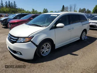 2015 Honda Odyssey Touring Elite с VIN 5FNRL5H92FB504977, выставлен на аукционе Copart как лот 56657195 с пробегом 189 438 миль миль и Списание • Salvage title. История ставок и продаж доступна на DreamBid. Изображение 1.
