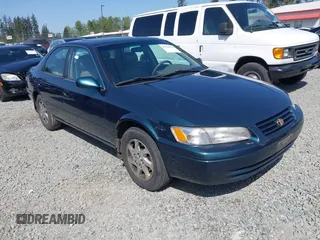 1998 Toyota Camry LE z VIN JT2BF28K4W0101312, wystawiony jako IAAI lot #42116546 z przebiegiem 365 712 mil mil oraz . Historia ofert i sprzedaży dostępna na DreamBid. Obrazek 1.