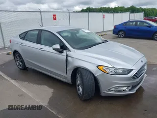 2017 Ford Fusion SE z VIN 3FA6P0H71HR394987, wystawiony jako IAAI lot #42256283 z przebiegiem 82 480 mil mil oraz . Historia ofert i sprzedaży dostępna na DreamBid. Obrazek 1.