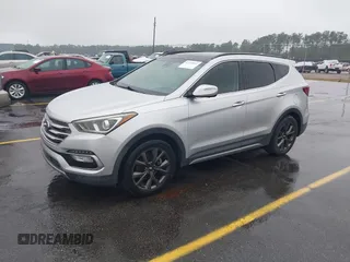 2017 Hyundai Santa Fe Ultimate z VIN 5XYZW4LA3HG472104, wystawiony jako IAAI lot #42352652 z przebiegiem 114 205 mil mil oraz . Historia ofert i sprzedaży dostępna na DreamBid. Obrazek 2.