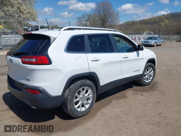 2016 Jeep Cherokee Latitude with VIN 1C4PJMCS3GW133617, listed as a IAAI auction lot 42049206 with 155,056 mi miles. Bid and sale history available at carsss.com. Image 4.