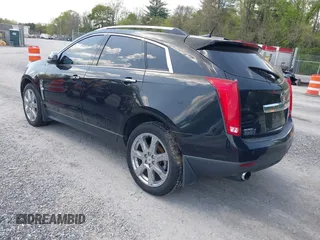 2012 Cadillac SRX Performance Collection with VIN 3GYFNEE32CS512118, listed as a IAAI auction lot 42158452 with 143,449 mi miles. Bid and sale history available at carsss.com. Image 3.