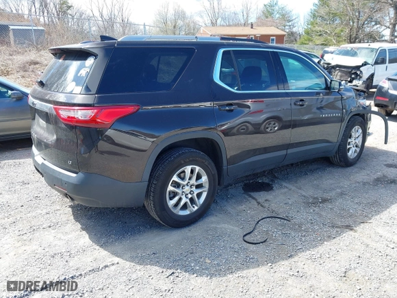 2018 Chevrolet Traverse LT Cloth with VIN 1GNERGKW2JJ263972, listed as a IAAI auction lot 41774086 with 112,296 mi miles. Bid and sale history available at carsss.com. Image 4.