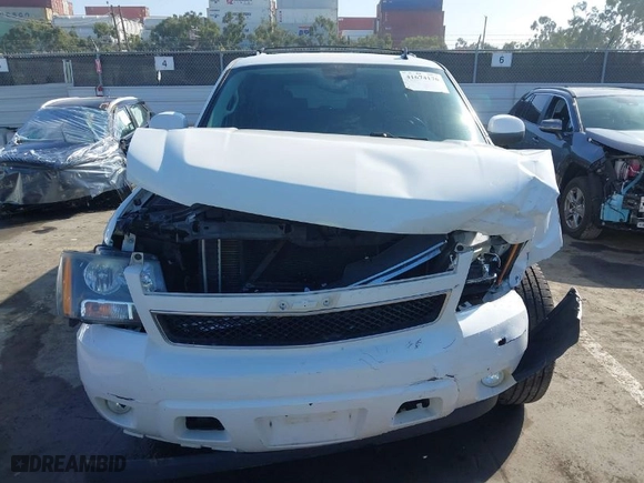 2014 Chevrolet Suburban LT with VIN 1GNSKJE71ER122990, listed as a IAAI auction lot 41674176 with NaN miles. Bid and sale history available at carsss.com. Image 12.