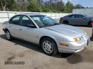 2002 Saturn SL with VIN 1G8ZK52752Z190850, listed as a Copart auction lot 61399245 with 200,085 mi miles and Salvage title. Bid and sale history available at DreamBid. Image 4.