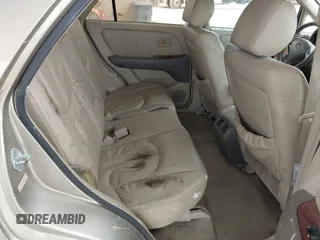 1999 Lexus RX 300 Luxury SUV with VIN JT6HF10U2X0018835, listed as a IAAI auction lot 41875166 with 134,861 mi miles. Bid and sale history available at carsss.com. Image 8.