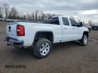 2019 GMC Sierra 1500 SLE z VIN 2GTV2MEC0K1170652, wystawiony jako Copart lot #53474495 z przebiegiem 58 181 mil mil oraz Czysty tytuł • Clean title. Historia ofert i sprzedaży dostępna na DreamBid. Obrazek 3.