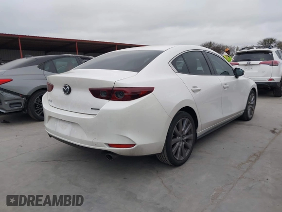 2021 Mazda 3 Preferred with VIN JM1BPACL3M1319795, listed as a IAAI auction lot 41780953 with 54,405 mi miles and . Bid and sale history available at DreamBid. Image 4.