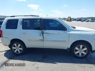 2015 Honda Pilot Touring with VIN 5FNYF3H92FB020766, listed as a IAAI auction lot 41983315 with 201,086 mi miles. Bid and sale history available at carsss.com. Image 13.
