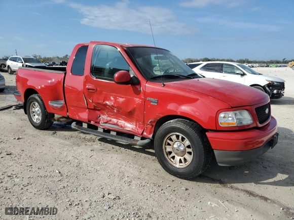2002 Ford F-150 XL with VIN 2FTRX07WX2CA98348, listed as a Copart auction lot 43705135 with 204,718 mi miles and Salvage Title. Bid and sale history available at carsss.com. Image 4.