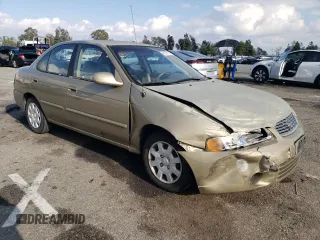 2000 Nissan Sentra XE with VIN 3N1CB51D3YL311011, listed as a Copart auction lot 71841274 with 146,760 mi miles and Salvage title. Bid and sale history available at DreamBid. Image 4.