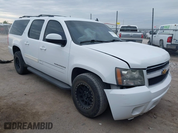 2013 Chevrolet Suburban LT with VIN 1GNSCJE05DR147101, listed as a IAAI auction lot 42336950 with 147,429 mi miles and . Bid and sale history available at DreamBid. Image 1.